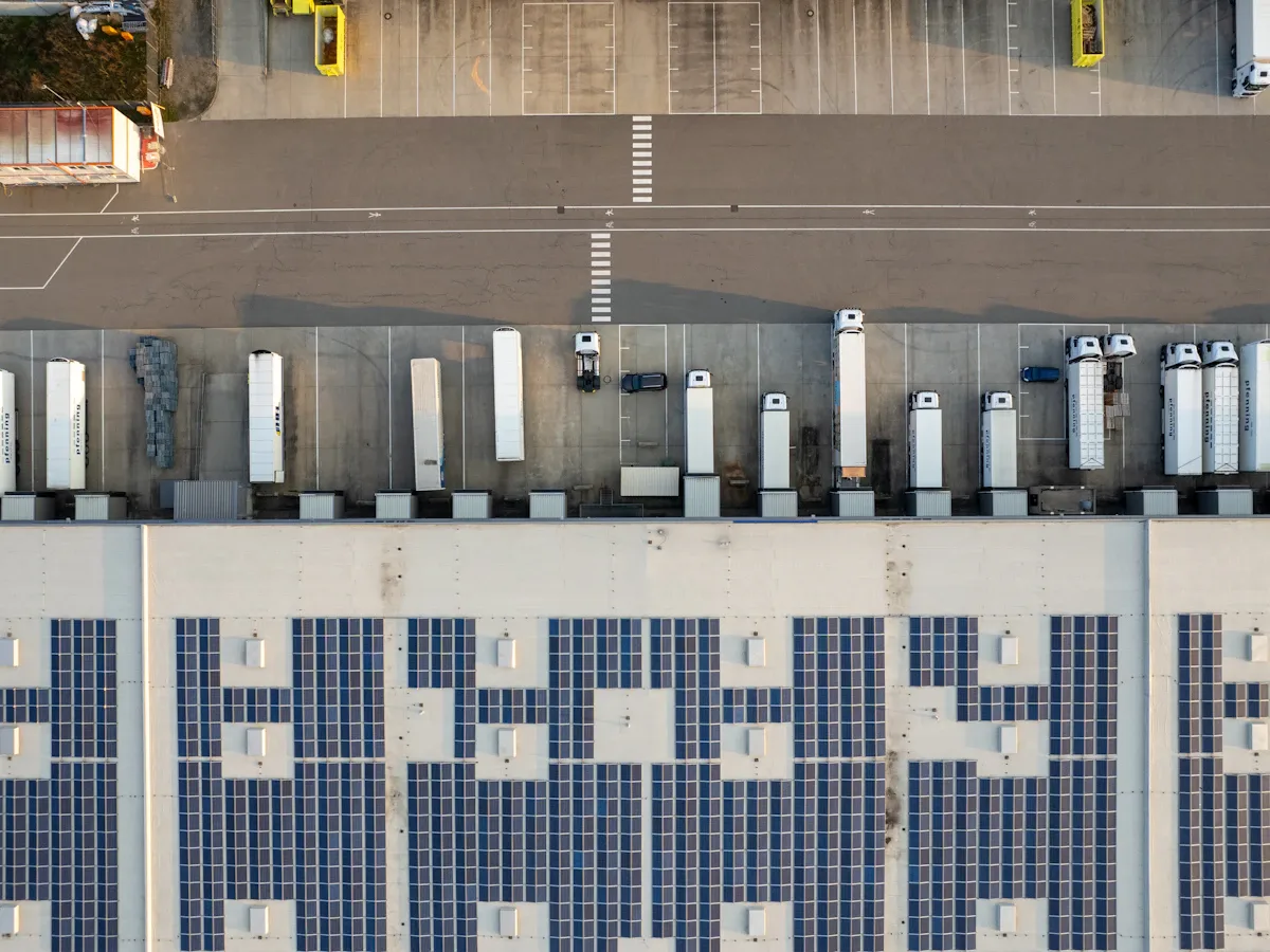 Commercial parking lot and truck yard beside a warehouse
