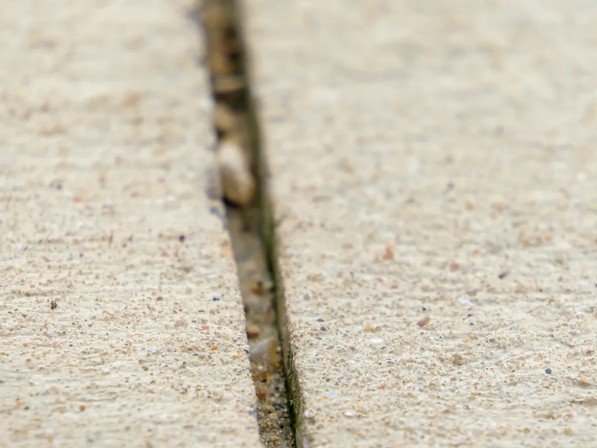 Gap between two concrete slabs that needs joint repair Gap between two concrete slabs that needs joint repair