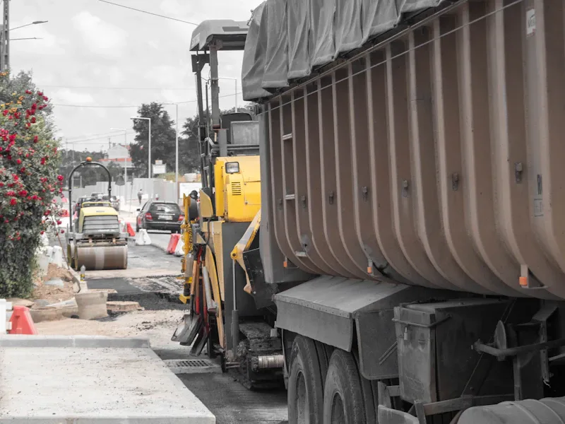 Heavy equipment building a new road surface